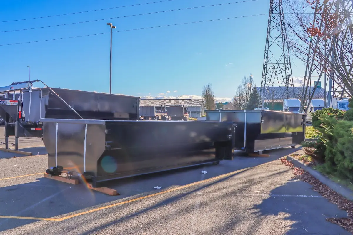 Roll-off dumpster ready for waste disposal at job site for Yard Waste Dumpster Rental in Scappoose